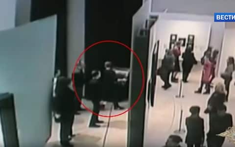 CCTV videos captured the moment when a man took the painting by Arkhip Kuindzhi off the wall at the Tretyakov Gallery and walked away casually, - Credit: Российское Мнение&nbsp;