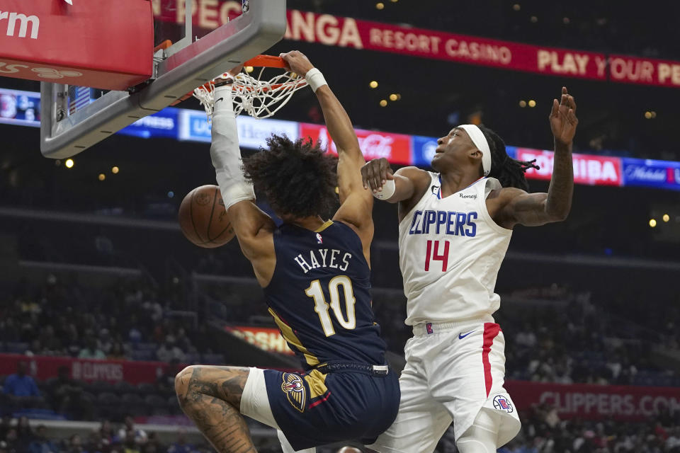 New Orleans Pelicans center Jaxson Hayes (10) dunks during the first half of an NBA basketball game against the Los Angeles Clippers on Sunday, Oct. 30, 2022, in Los Angeles, Calif. (AP Photo/Allison Dinner)