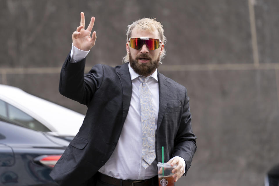 Anthime "Baked Alaska" Gionet, who livestreamed himself storming the U.S. Capitol in Jan. 6, arrives at federal court in Washington, Tuesday, Jan. 10, 2023. (AP Photo/Jose Luis Magana)