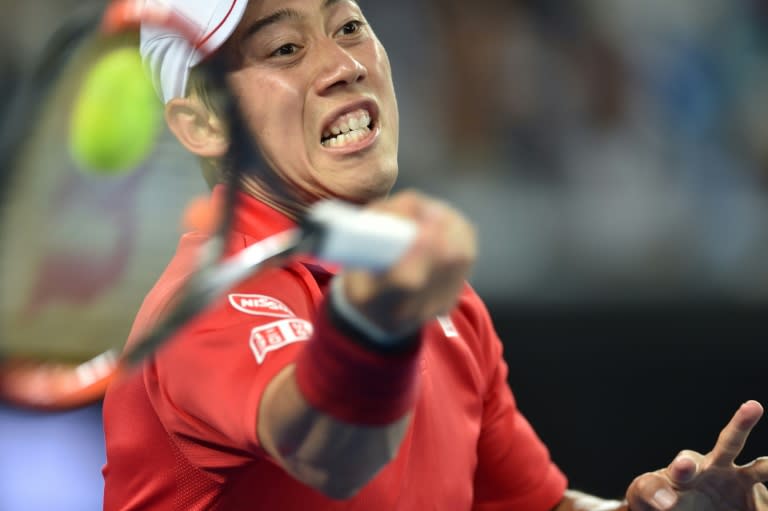 Japan's Kei Nishikori in action against Lukas Lacko of Slovakia during their third round match at the Australian Open in Melbourne on January 20, 2017