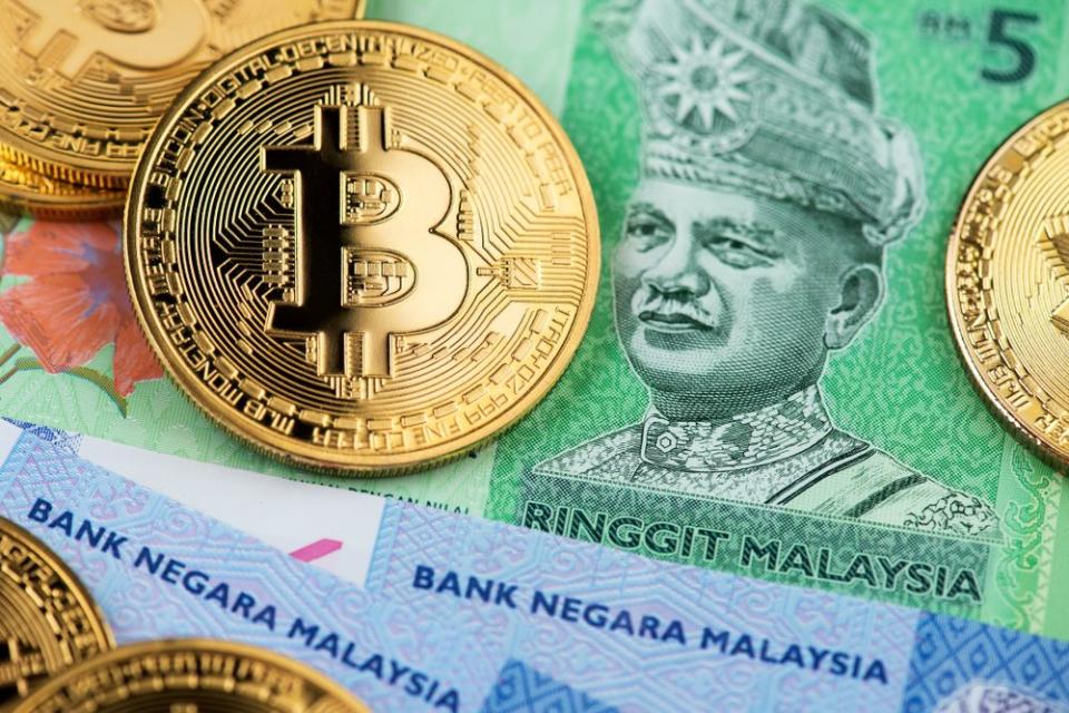 Malaysia's financial regulator is cracking down on unregistered crypto exchanges and ICOs. | Source: Shutterstock