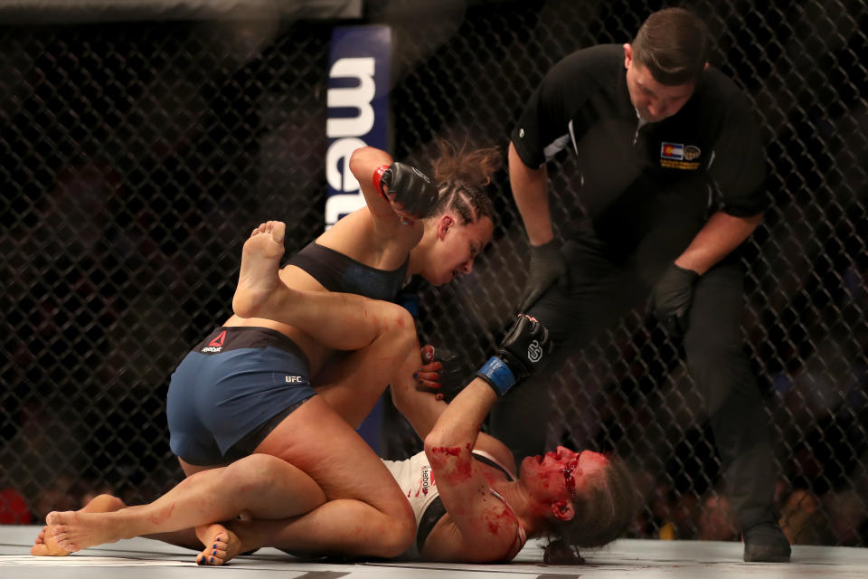 DENVER, CO - NOVEMBER 10:  Maycee Barber (red cuffs) fights Hannah Cifers (blue cuffs) in their Women's Strawweight bout during the UFC Fight Night 139 at the Pepsi Center on November 10, 2018 in Denver, Colorado.  (Photo by Matthew Stockman/Getty Images)