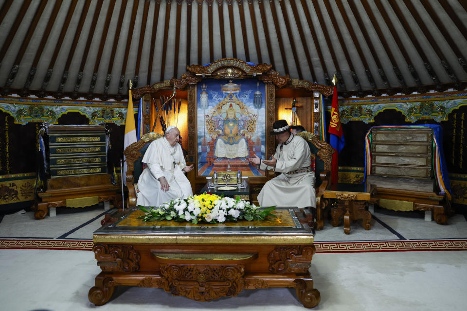 Mongolian President Ukhnaagin Khurelsukh, right, and Pope Francis meet, Saturday, Sept. 2, 2023, at the State Palace in Sukhbaatar Square in Ulaanbaatar. Pope Francis arrived in Mongolia on Friday morning for a four-day visit to encourage one of the world's smallest and newest Catholic communities. (AP Photo/Remo Casilli, pool)