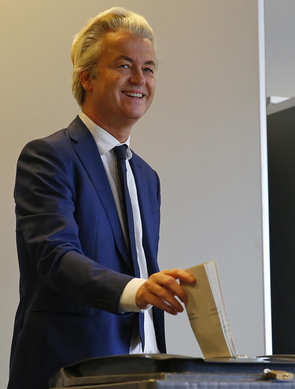 Geert Wilders casts his vote for the Dutch general election in The Hague, Netherlands, Wednesday, March 15, 2017. (AP Photo/Peter Dejong)