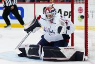 Washington Capitals goaltender Vitek Vanecek stops a shot during the first period of the team's NHL hockey game against the New Jersey Devils on Thursday, Oct. 21, 2021, in Newark, N.J. (AP Photo/Frank Franklin II)