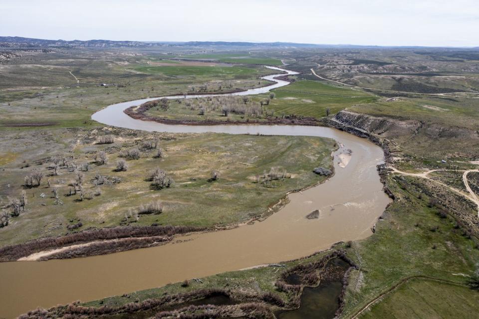 An aerial view of the Yampa River snaking through Cross Mountain Ranch.