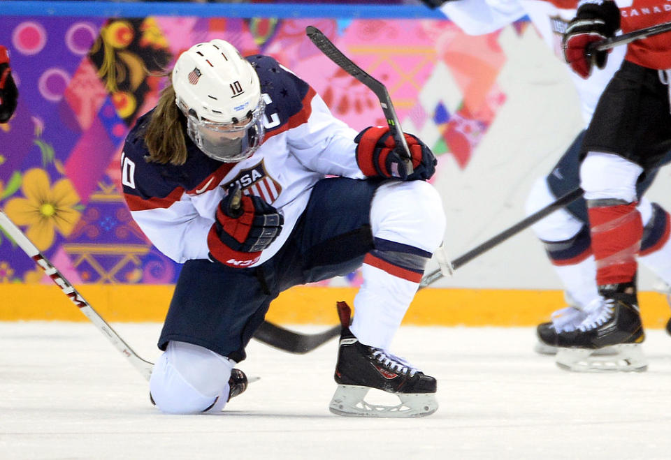 SOCHI, RUSSIA – FEBRUARY 20: Meghan Duggan #10 of the United States celebrates after scoring a second-period goal during the Ice Hockey Women’s Gold Medal Game on day 13 of the Sochi 2014 Winter Olympics at Bolshoy Ice Dome on February 20, 2014 in Sochi, Russia. (Photo by Harry How/Getty Images)