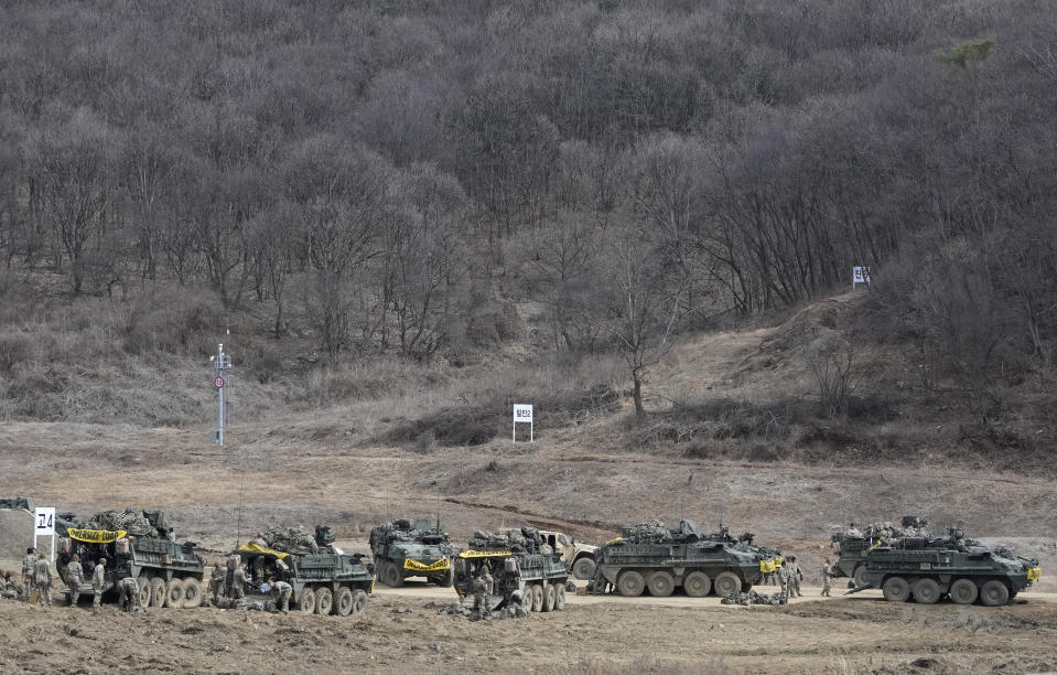 U.S. Army soldiers prepare for their exercise at a training field in Paju, South Korea, near the border with North Korea, Friday, March 17, 2023. North Korea said Friday it fired an intercontinental ballistic missile to "strike fear into the enemies" as South Korea and Japan agreed at a summit to work closely on regional security with the United States and staged military exercises around the region.(AP Photo/Ahn Young-joon)