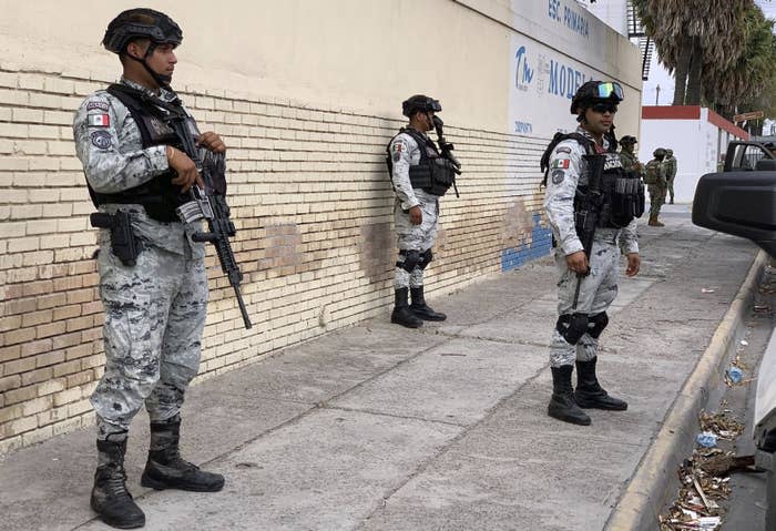 Members of the Mexican National Guard prepare for a search mission for the four on March 6.