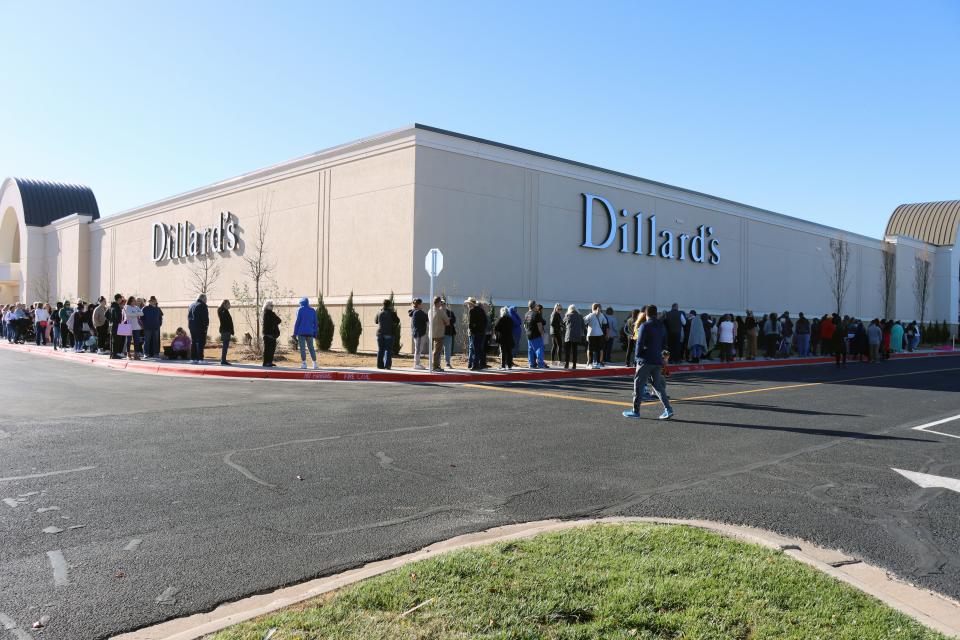 Hundreds line up for the grand opening of the Women's Dillard's at Westgate Mall Thursday morning.