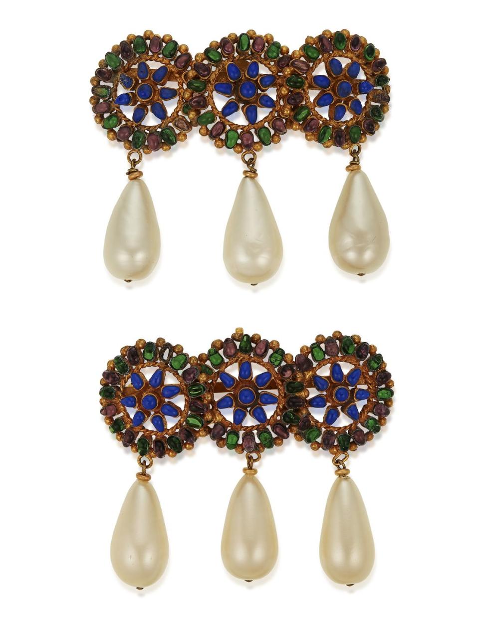 <p>Brooches are our favorite way to get Zoom-ready (besides having a craft cocktail nearby), and this beautiful pair is estimated to be worth $2,000 to $3,000. </p>