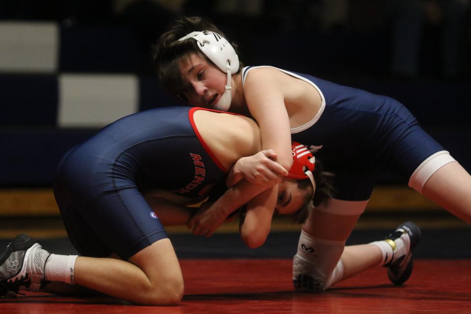 Jake Holly of Pope John defeated Aidan Reilly of Mendham by pin in the 106 lb. match as Pope John wrestled Mendham on January 5, 2022 at Mendham.