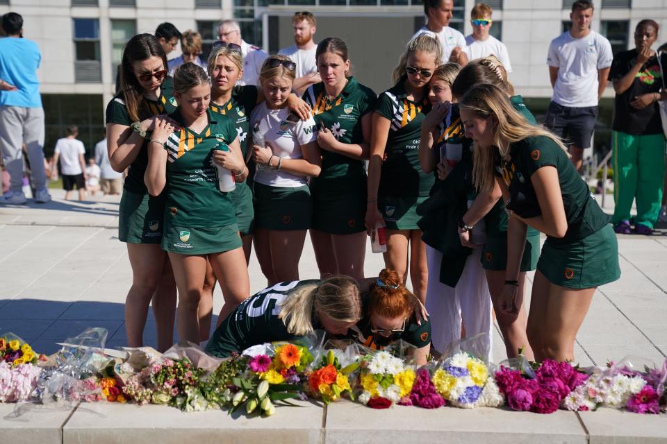 Team mates of victim Grace O'Malley Kumar lay flowers in her memory during a vigil at the University of Nottingham after she, Barnaby Webber and Ian Coates were killed and another three hurt in connected attacks on Tuesday morning. Picture date: Wednesday June 14, 2023.