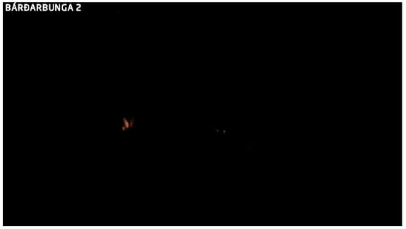 A webcam screen capture shows glowing lava erupting north of Iceland's Bardarbunga volcano.