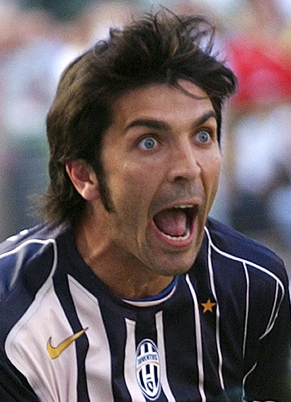 FILE - Juventus goalkeeper Gianluigi Buffon reacts at the end of an Italian first division match between AC Milan and Juventus at the San Siro stadium in Milan, Italy, on May 8, 2005 photo. At age 45 and after a career that included a World Cup title with Italy, a long list of trophies with Juventus and many years when he was considered among the best goalkeepers in soccer, Gianluigi Buffon announced his retirement on Wednesday, Aug. 2, 2023. (AP Photo/Alberto Pellaschiar/Files)