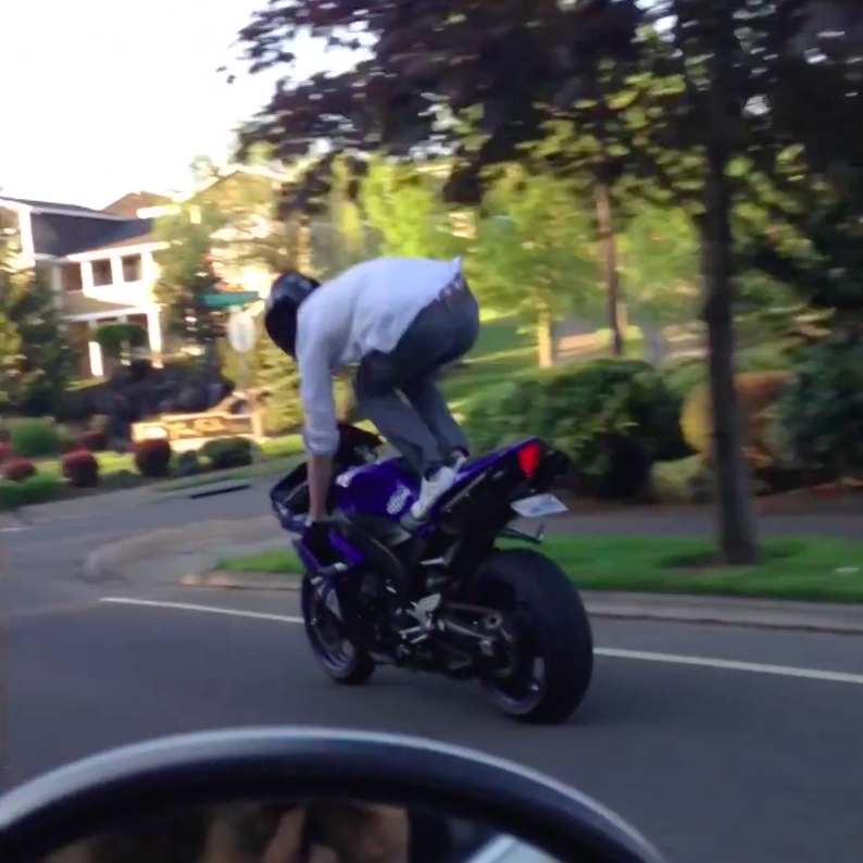Note to self: Don't stand on a motorbike. Photo: Storyful
