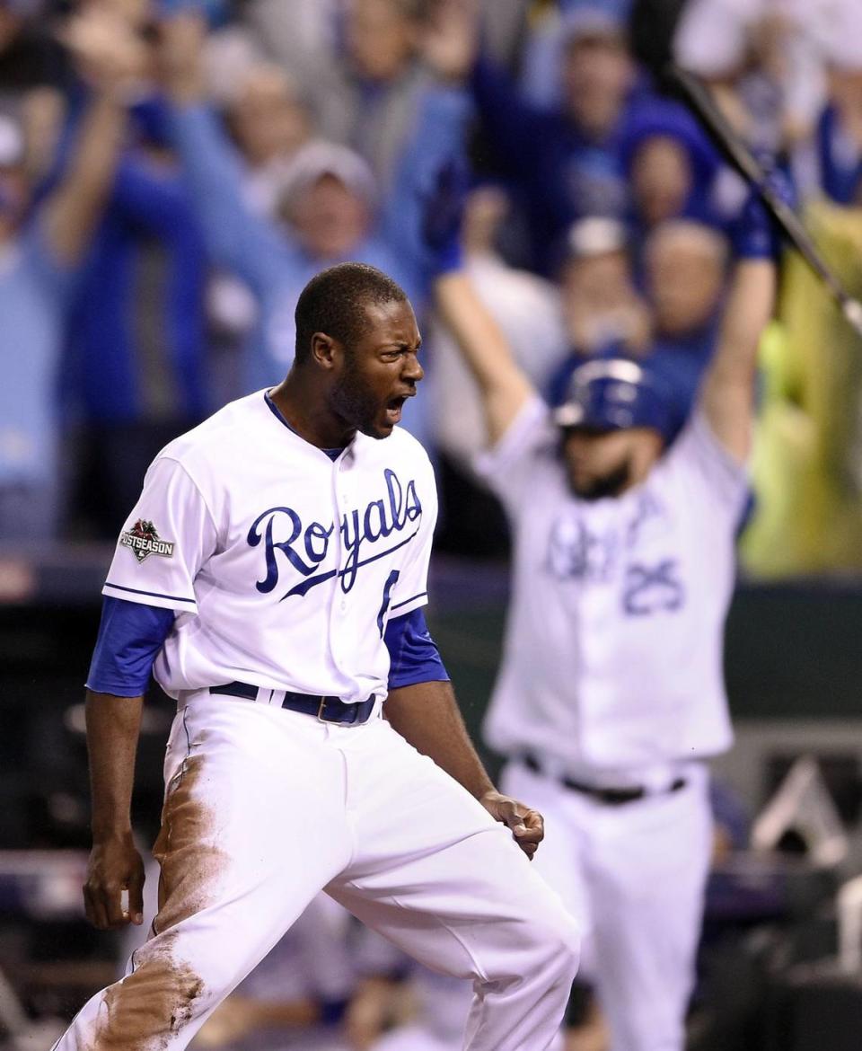 Kansas City Royals center fielder Lorenzo Cain celebrates scoring on an RBI single in the eighth inning by first baseman Eric Hosmer during an ALCS baseball game on October 23, 2015 at Kauffman Stadium in Kansas City, Mo.