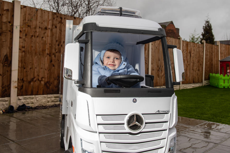 Little Hugene Wilkes, 4, loves nothing more than travelling around his local park in the impressive toy, which has a top speed of 5mph and a battery life of over an hour. (SWNS) 