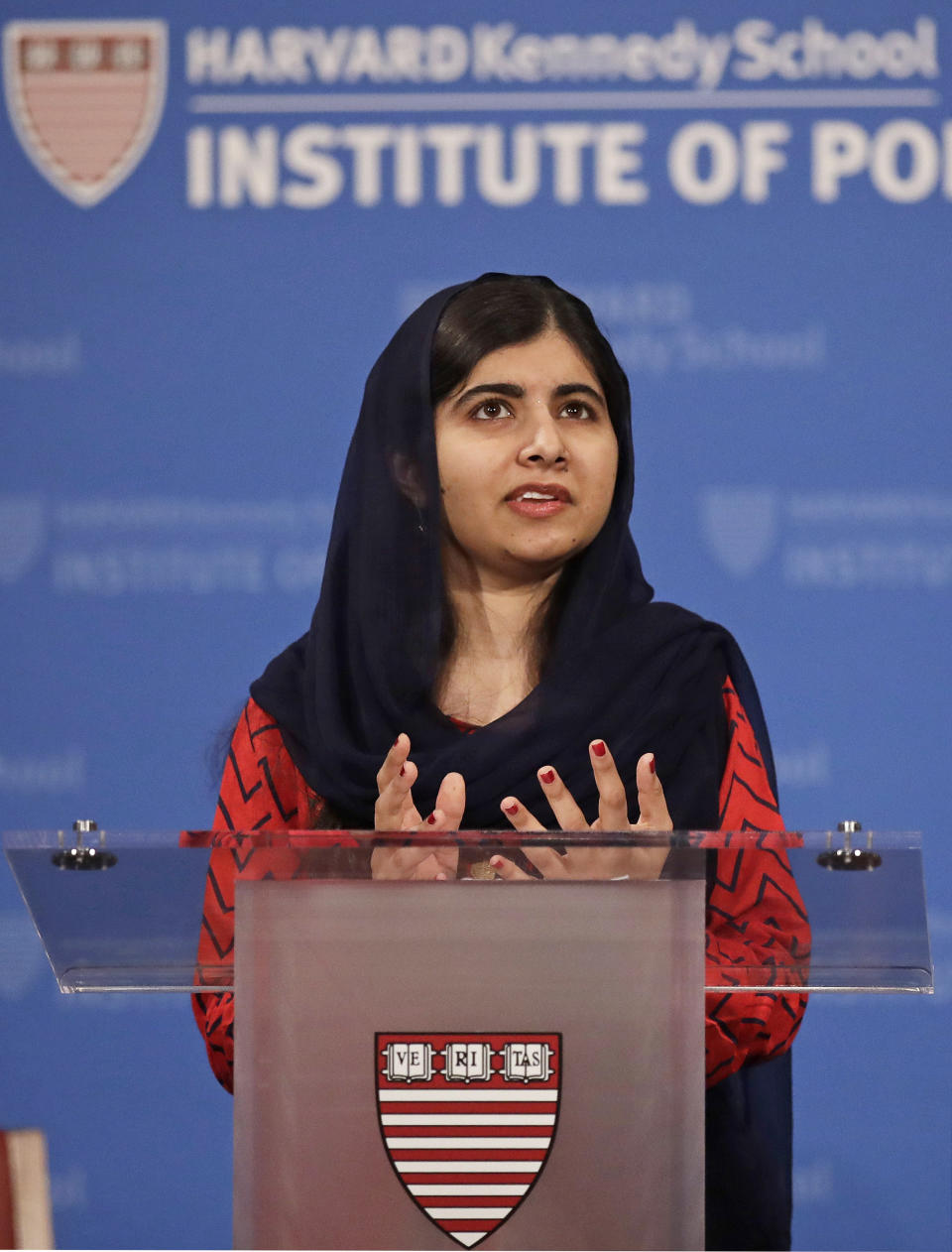 2014 Nobel Laureate Malala Yousafzai gestures during an address at the Kennedy School's Institute of Politics at Harvard University, Thursday, Dec. 6, 2018. (AP Photo/Charles Krupa)