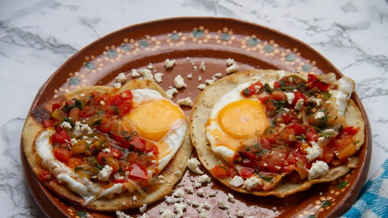 Huevos rancheros on plate