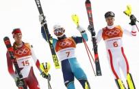 Alpine Skiing - Pyeongchang 2018 Winter Olympics - Men's Slalom - Yongpyong Alpine Centre - Pyeongchang, South Korea - February 22, 2018 - Ramon Zenhaeusern of Switzerland, Andre Myhrer of Sweden and Michael Matt of Austria react. REUTERS/Kai Pfaffenbach