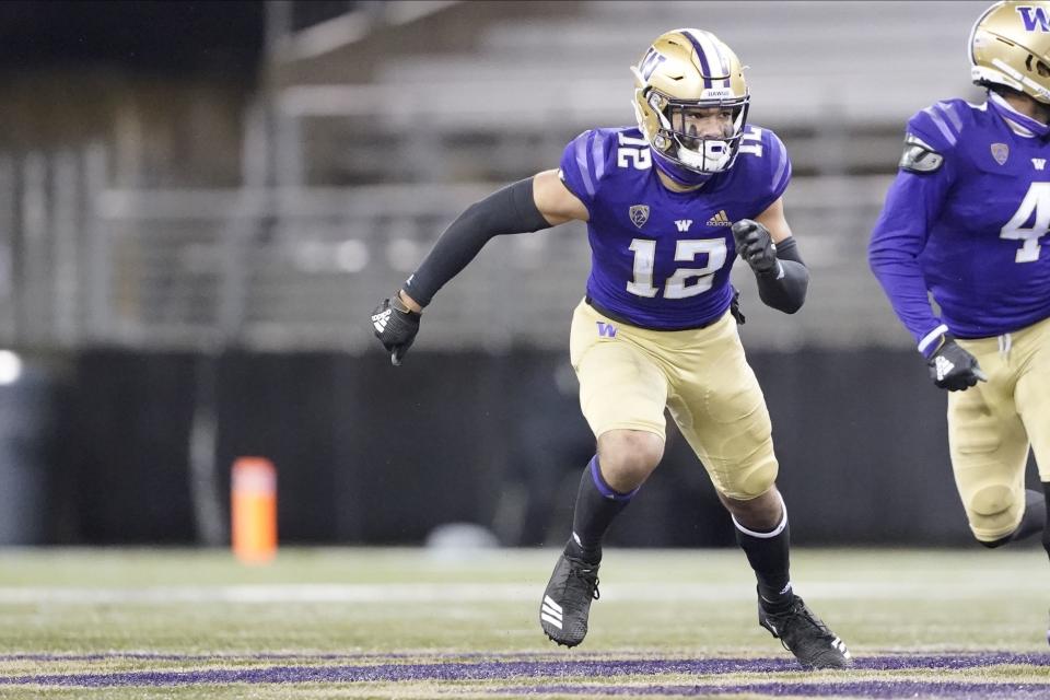 Washington wide receiver Puka Nacua in action against Oregon State, Saturday, Nov. 14, 2020, in Seattle. After two years with the Huskies Nacua transferred to BYU. The rest is history. | Ted S. Warren, Associated Press