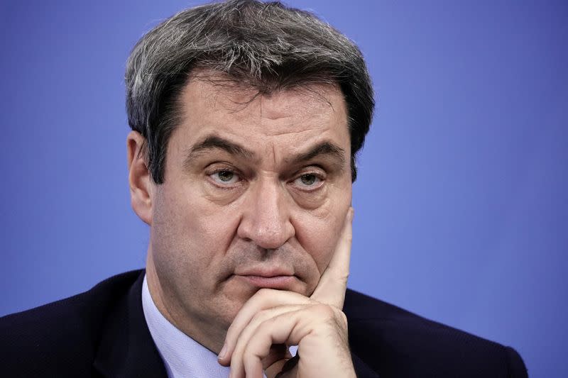 FILE PHOTO: Bavarian State Premier Markus Soeder attends a news conference after talks with state leaders at the Chancellery in Berlin, Germany