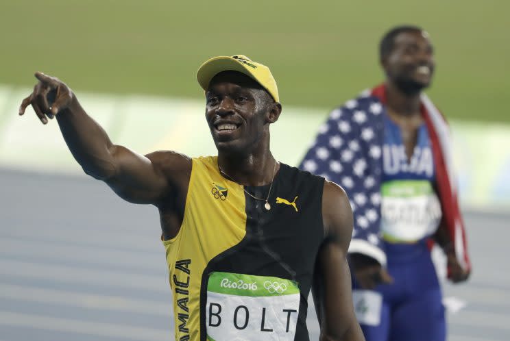 Usain Bolt won his third straight Olympic gold in the 100 meter on Sunday. (AP)