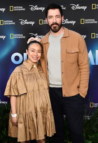 <p>Scott Kirkland/PictureGroup for National Geographic/Shutterstock</p> Linda Phan and Drew Scott at Disney and National Geographic's kickoff of 'ourHOME' in Los Angeles on April 3, 2024