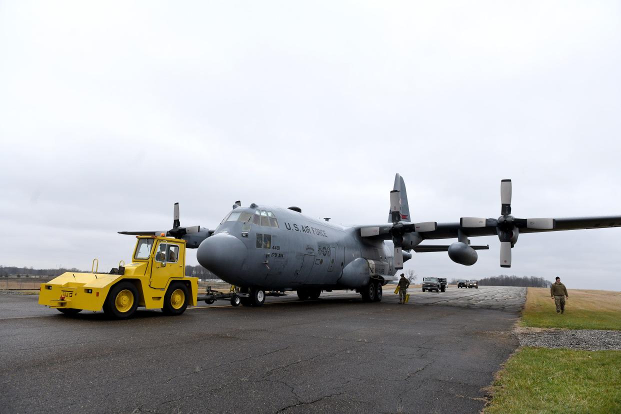 A C-130H Hercules Air Force combat cargo aircraft, with guidance from the Mansfield-based Ohio Air National Guard 179th Airlift Wing, makes its way Saturday to the MAPS Air Museum in Green.