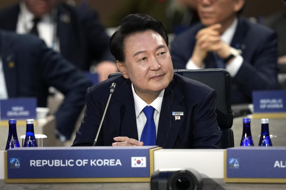 South Korea's President Yoon Suk Yeol attends a session of the NATO summit with Indo-Pacific Partners Thursday July 11, 2024, in Washington. (AP Photo/Matt Rourke)