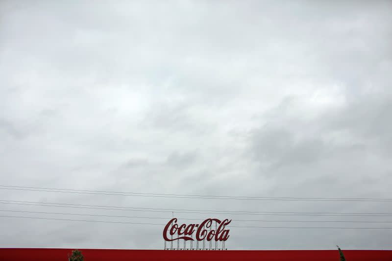 FILE PHOTO: Coca-Cola signage is pictured at a bottling plant near Seville