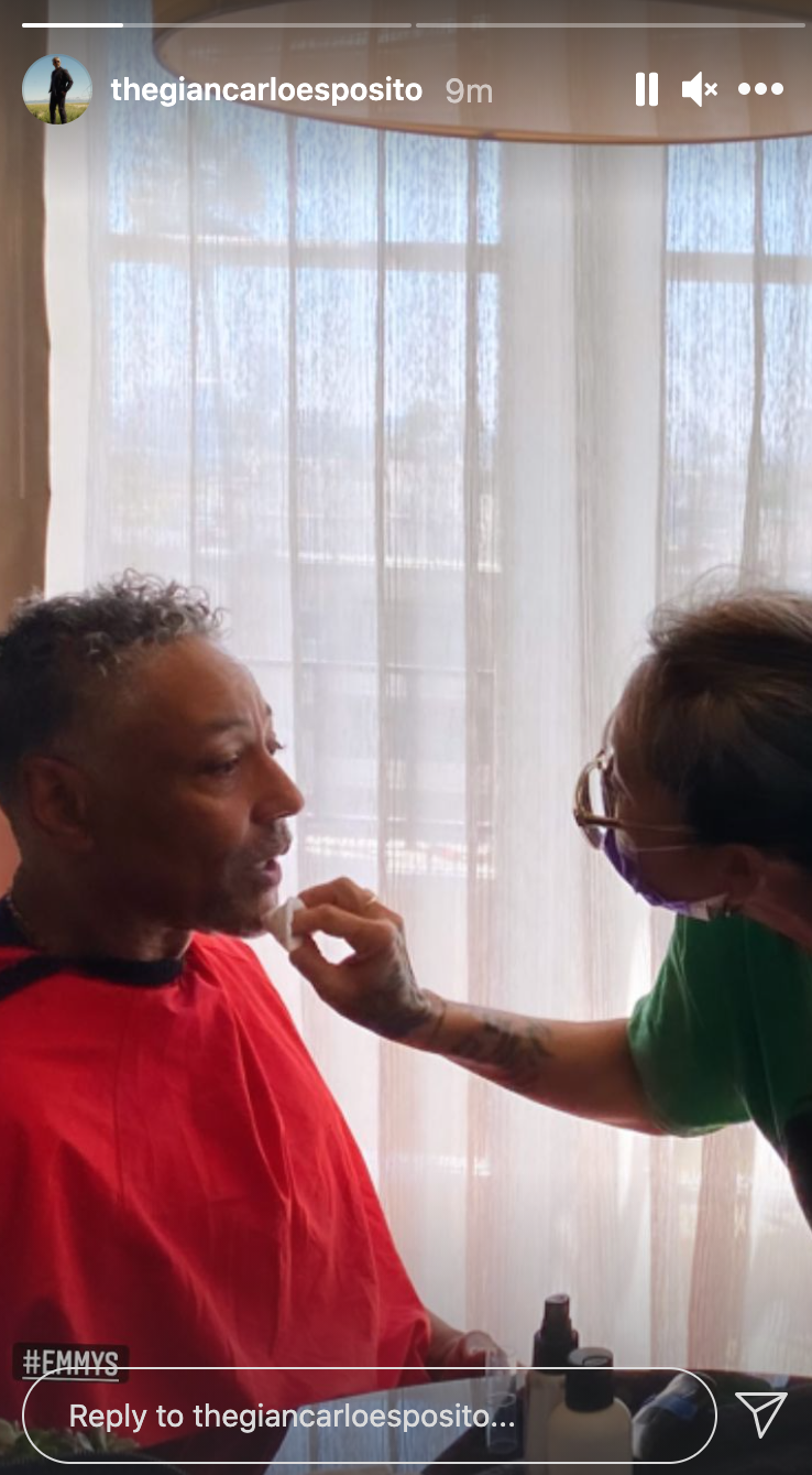 A close up of Giancarlo Esposito as he gets his makeup done