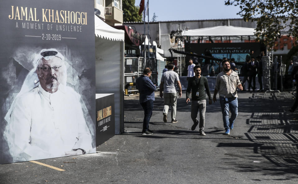 Image: People walk past a poster honoring the first anniversary of Saudi journalist, Jamal Khashoggi's murder in Istanbul, Turkey on October 2, 2019. (Elif Ozturk / Anadolu Agency via Getty Images)