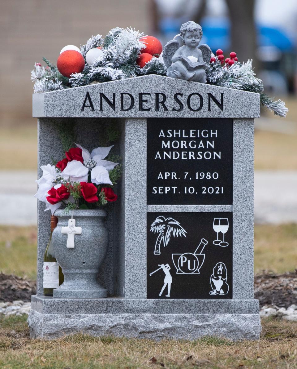 Ashleigh Anderson is buried at Tippecanoe Memory Gardens in West Lafayette, Indiana. Atop her grave sits a large headstone, upon which are etched five drawings representing the most important parts of her life. A basset hound, a golfer, a palm tree and two half-full wine glasses each appear in one of the panel’s four corners. Occupying the most prominent spot in the middle is a mortar and pestle – the iconic symbol of a pharmacist.
