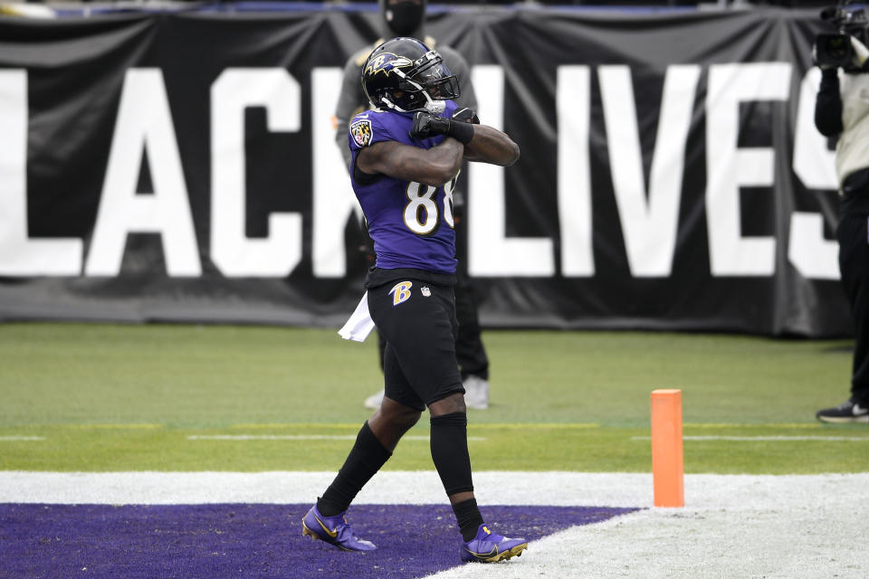 Baltimore Ravens wide receiver Dez Bryant reacts after scoring a touchdown against the Jacksonville Jaguars during the first half of an NFL football game, Sunday, Dec. 20, 2020, in Baltimore. (AP Photo/Nick Wass)