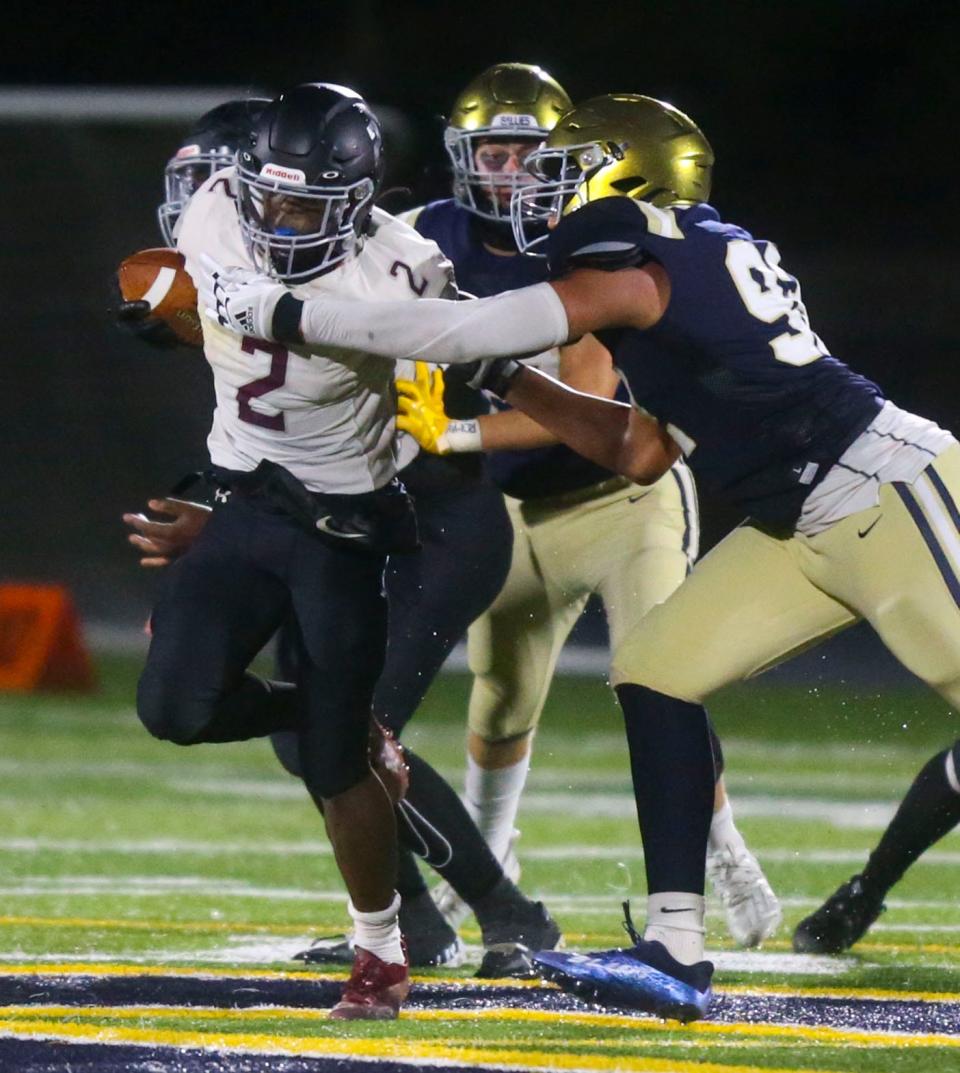 Ahmaad Foster (right) is among the experienced returnees on defense for Salesianum.