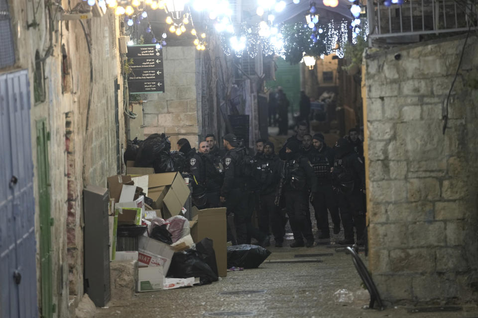 Israeli police are deployed near the Al-Aqsa Mosque compound after shots were fired in the Old City of Jerusalem during the Muslim holy month of Ramadan, Saturday, April 1, 2023. (AP Photo/ Mahmoud Illean)