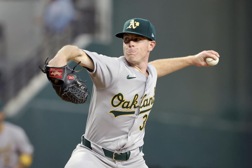 Oakland Athletics pitcher JP Sears throws during the second inning of a baseball game against the Texas Rangers Thursday, April 11, 2024, in Arlington, Texas. (AP Photo/Michael Ainsworth)