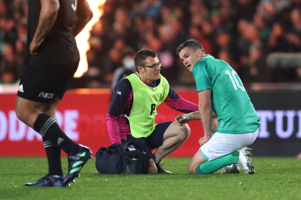 Seen here, Ireland's Johnny Sexton receives medical attention after a head knock in the first Test against the All Blacks at Eden Park in 2022. 