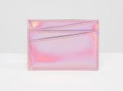 <p>Card holders are one of those things everyone should have. This metallic one amps up the style factor. <a rel="nofollow noopener" href="http://www.asos.com/monki/monki-metallic-card-holder/prd/7336383?iid=7336383&clr=Pink&SearchQuery=christmas&pgesize=36&pge=11&totalstyles=4090&gridsize=3&gridrow=3&gridcolumn=3" target="_blank" data-ylk="slk:ASOS, £5;elm:context_link;itc:0;sec:content-canvas" class="link "><i>ASOS, £5</i></a> </p>