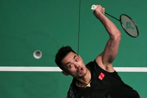 China's Lin Dan hits a return against Japan's Kanta Tsuneyama during their men's singles quarter-final match at the Malaysia Open badminton tournament in Kuala Lumpur