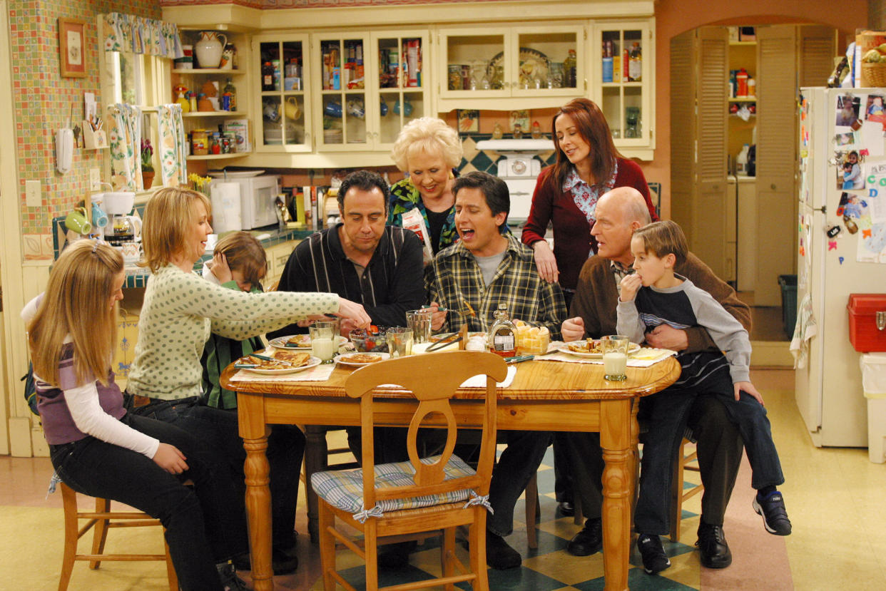 LOS ANGELES - APRIL 16:  The Barone family enjoys Marie's home cooking on the May 16 series finale of EVERYBODY LOVES RAYMOND.  From left to right:  Madlyin Sweeten, Monica Horan, Sawyer Sweeten, Brad Garrett, Doris Roberts, Ray Romano, Patricial Heaton, Peter Boyle, Sullivan Sweeten.  (Photo by Robert Voets/CBS Photo Archive/Getty Images)