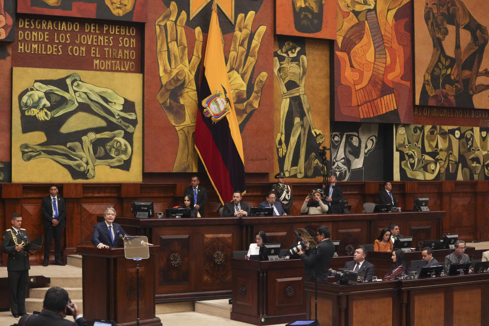 Ecuadorean President Guillermo Lasso speaks during at a National Assembly session where opposition lawmakers seek to try him for embezzlement accusations in Quito, Ecuador, Tuesday, May 16, 2023. (AP Photo/Dolores Ochoa)