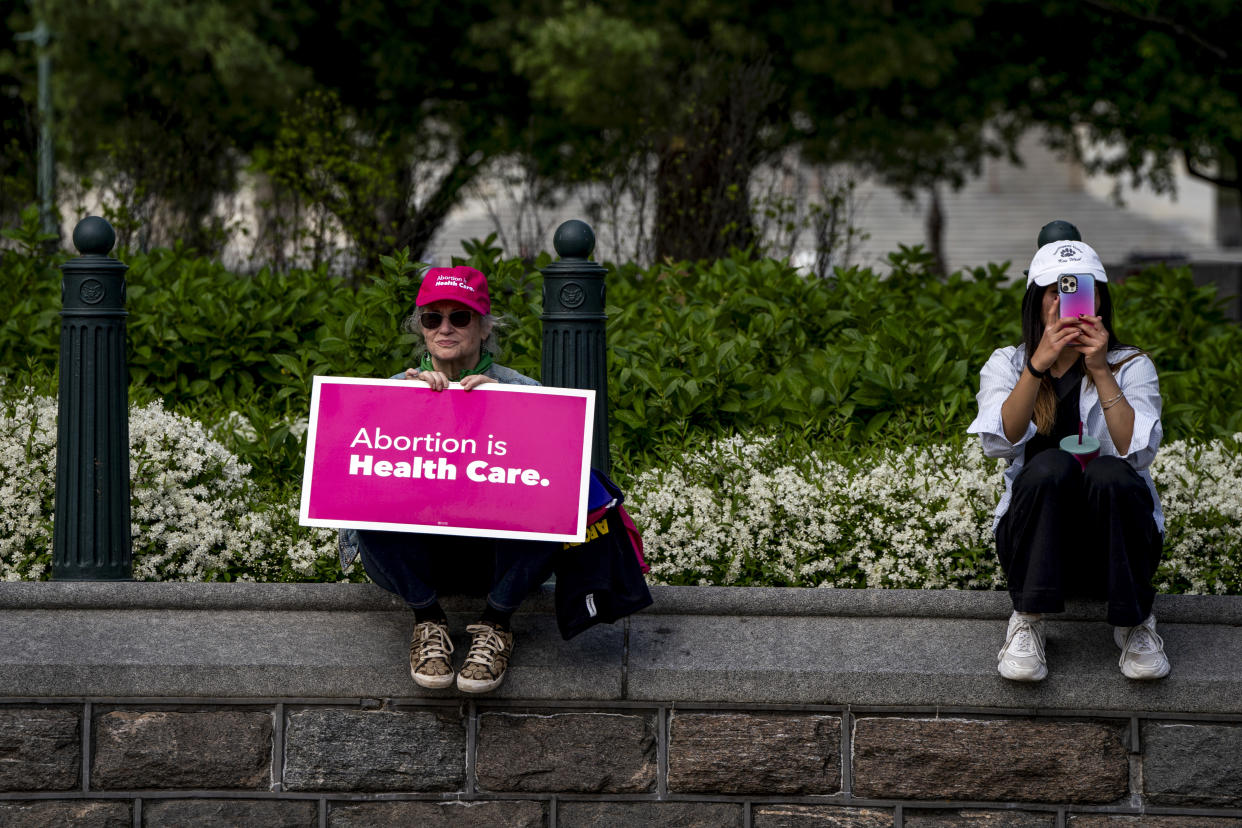 Abortion rights protesters outside the Supreme Court in Washington, on Wednesday morning, April 24, 2024. (Haiyun Jiang/The New York Times)