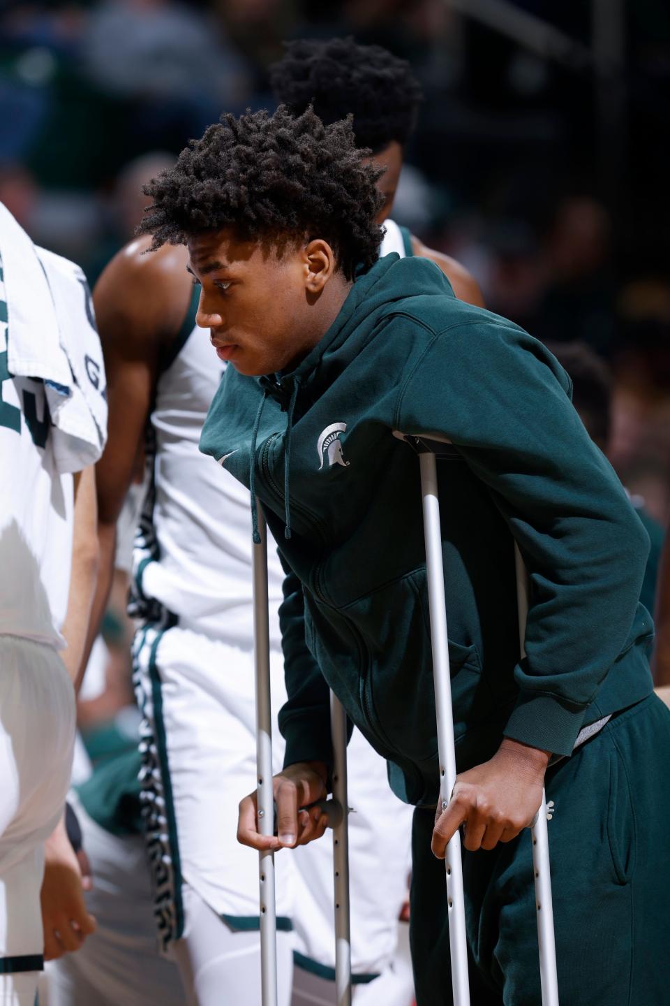Michigan State guard Jeremy Fears Jr. walks on crutches during the first half of an NCAA college basketball game against Indiana State at Breslin Center in East Lansing on Saturday, Dec. 30, 2023.