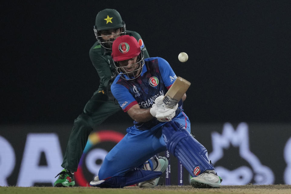 Afghanistan's Rahmat Shah plays a shot during the ICC Men's Cricket World Cup match between Pakistan and Afghanistan in Chennai , India, Monday, Oct. 23, 2023. (AP Photo/Anupam Nath)