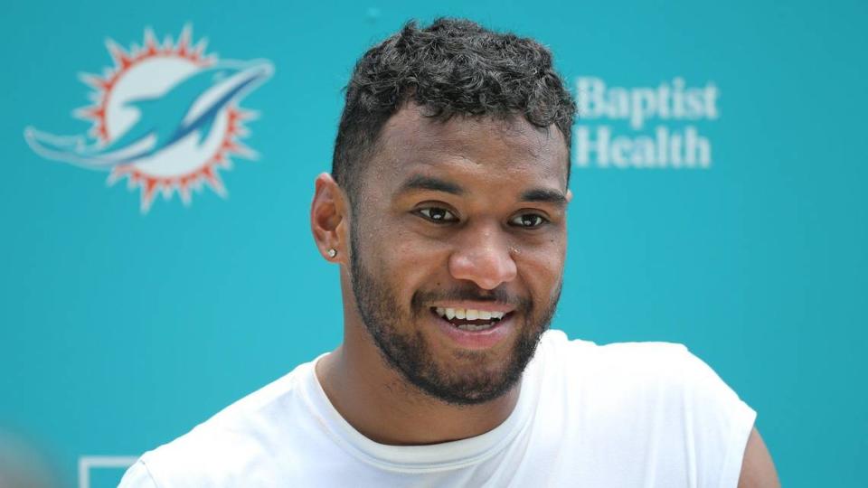 Miami Dolphins quarterback Tua Tagovailoa (1) speaks to reporters after practice drills at Baptist Health Training Complex in Miami Gardens on Wednesday, August 17, 2022.