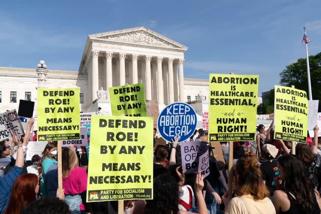 Demonstrators protest outside of the U.S. Supreme Court on Tuesday. (Photo: Jose Luis Magana via Associated Press)