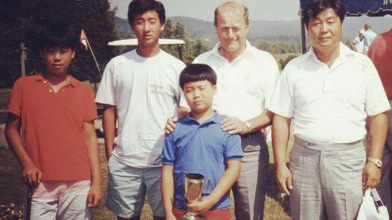 David Chang holding a trophy